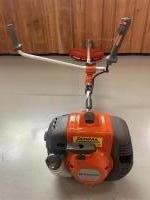 Husqvarna 135R Bosmaaier incl nieuw draagstel en mes.
